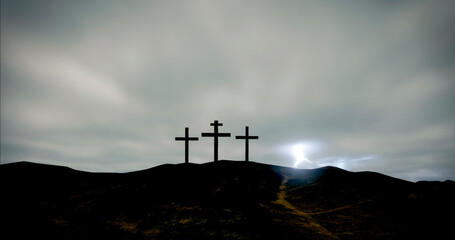 Three crosses on the hill with sky becoming cloudy and lightning