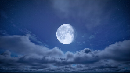 Full moon night on starry sky with moving clouds