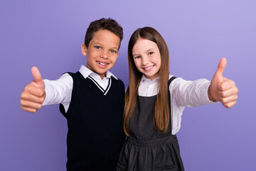 Photo of best buddies schoolkids make thumb up symbol advertise academic courses isolated purple...
