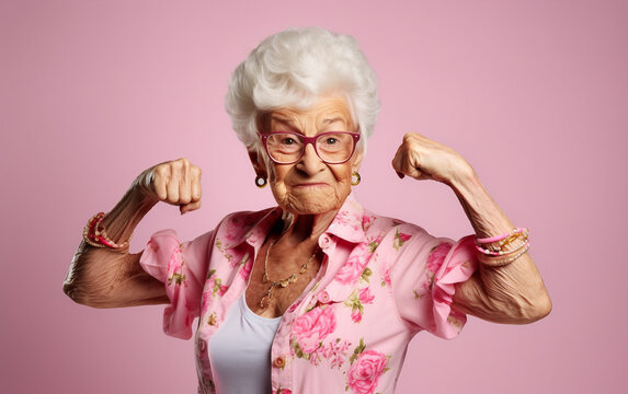 Elderly Funny And Joyful Woman Shows Her Biceps