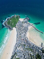 Aerial view of the scenic St Ives Harbor on a sunny day in Cornwall, England