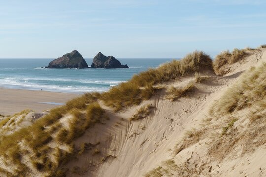 View of the rugged coastline of Holywell Bay in Cornwall, UK during the month of February