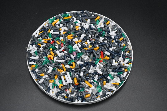 colorful plastic scraps The universe of plastic waste