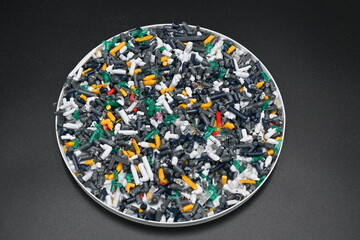 colorful plastic scraps The universe of plastic waste