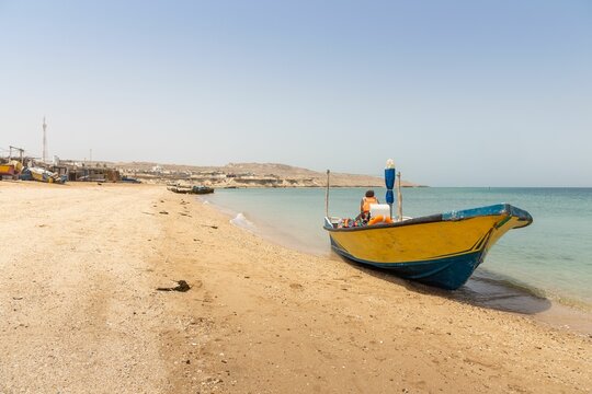 A Boat on the Shore of a Beach on Hengam Island, Near Qeshm Island in Iran.