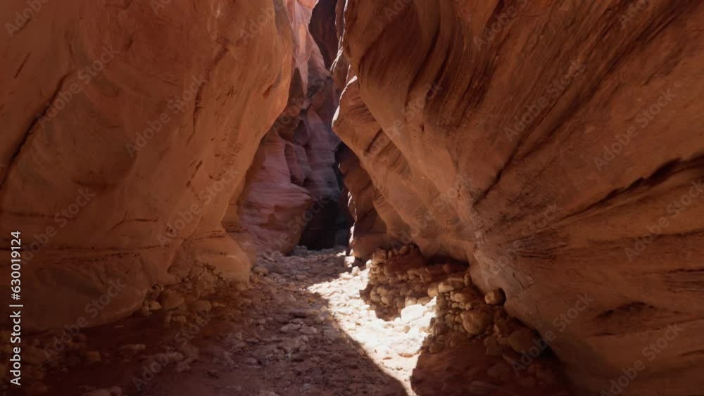 Wall mural Pass inside canyon cliffs of Hiking Wire Pass on a sunny day in Utah, USA