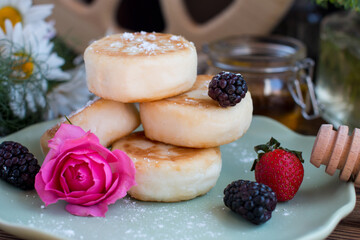 curd cheesecakes on a black plate. Grocery still life, cooking recipe