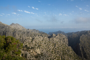 Hiking holidays Mallorca, Spain. Beautiful picture with landscape of Serra de Tramuntana mountains in the island of Majorca in Mediterranean sea. Paradise for bikers. Adventure travel.