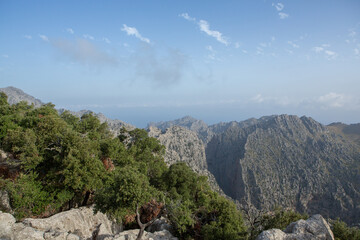 Naklejka premium Hiking holidays Mallorca, Spain. Beautiful picture with landscape of Serra de Tramuntana mountains in the island of Majorca in Mediterranean sea. Paradise for bikers. Adventure travel.