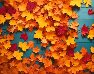 Naklejka na ściany i meble Autumn wallpaper with orange and red leaves on blue wooden background, banner design 