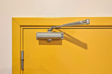 Door closer for entrance door. Automatic hydraulic device, leaver hinge door closer holder, Yellow...