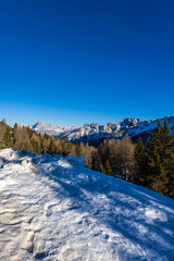 Beautiful alpine panoramic view of snowy mountains, beautiful European winter mountains in Italy...