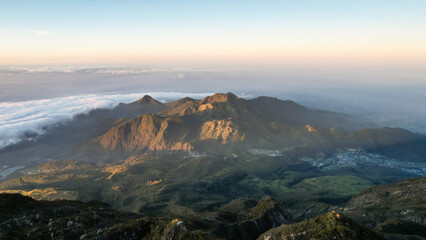 The beautiful Landscape view from Lawu Mountain at sunrise located in Magetan. One of the most...