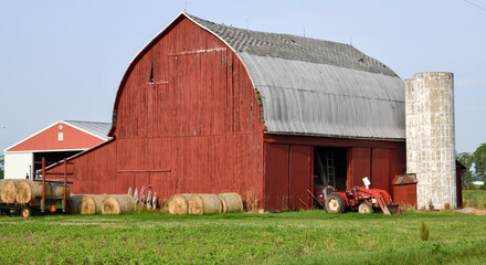 Vintage weathered and worn old farm barn and storage  - Powered by Adobe