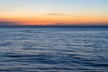Fototapeta na wymiar Sunset skyline and the sea