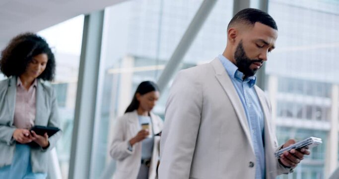 Business people, walking and phone in airport to check travel, booking or flight schedule information on mobile app. Businessman, reading and typing on smartphone with team, group and technology