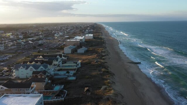 Aerial View of the beach in Kill Devil Hills Outer Banks North Carolina during Golden Hour 