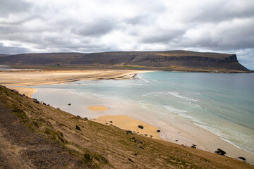 Fototapeta na wymiar View of a yellow sand beach in Iceland