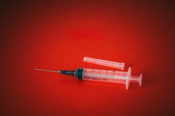 Medical syringe with a needle filled with medicine