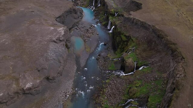 DRONE AERIAL FOOTAGE: Sigoldugljufur, also known as the Valley of Tears, is a canyon in the Icelandic Highlands. It is most renowned for and earned its nickname from its sheer number of waterfalls.