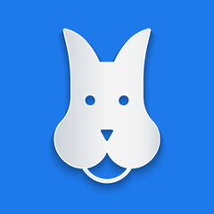 Paper cut Dog icon isolated on blue background. Paper art style. Vector