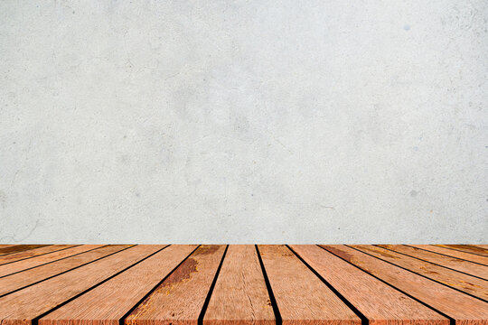 close up mockup plain white color cement wall texture background with vintage brown wood panel table top shelf  perspective for show, ads , promote product on display concept