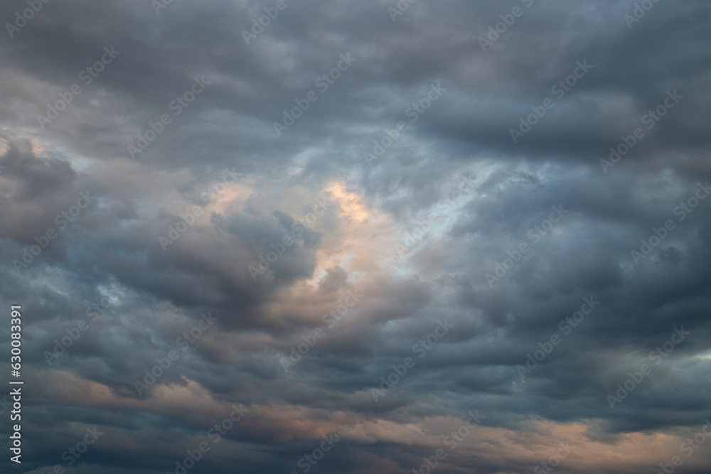 Wall mural storm clouds.background of the summer sky with thunderclouds.