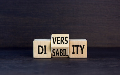 DEI Diversity or disability symbol. Concept words Diversity disability on wooden block. Beautiful grey table grey background. Business diversity disability concept.