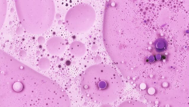 Fantastic Abstract Pink Purple Liquid With Small Beautiful Acrylic Bubbles And Oil Drops Floating On The Surface 