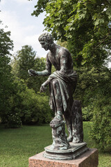 Antique bronze statues in the park.