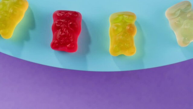 Jelly marmalade cola bottle bear close up, Confiture Bean candy jujube Marmalade bears with cod cannabis close up. 