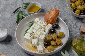 Feta cheese, olives  and ciabatta bread and olive oil , top view
