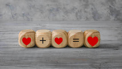 Love concept.  Five abstract geometric wooden blank dice isolate on white rustic surface.
