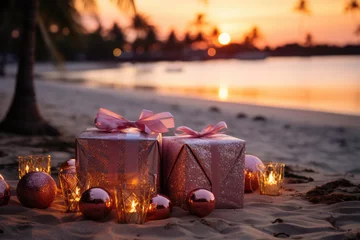 Selbstklebende Fototapete Dunkelbraun Pink Christmas gifts on tropical beach background. 