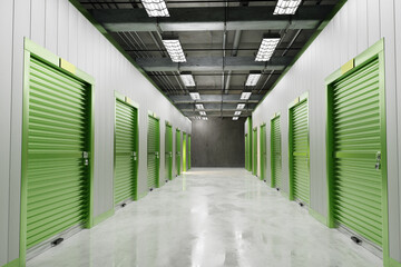 Rental Storage Units. Self storage unit cutaway. Storage box with green door. 3d image,
