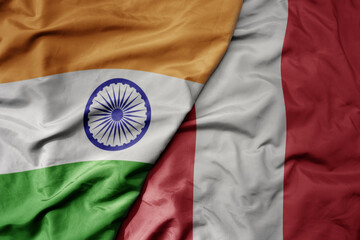 big waving realistic national colorful flag of india and national flag of peru .