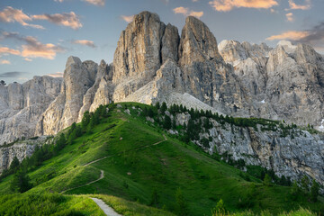 Serpentine in the Italian Alps mountains. Gardena pass,Passo Gardena, Rifugio Frara, Dolomiti, Dolomites, South Tyrol, Italy, UNESCO World Heritage. Aerial amazing shot. View from above.