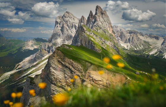 Drone view on Seceda peak. Trentino Alto Adige, Dolomites Alps, South Tyrol, Italy. Odle mountain range, Val Gardena. Majestic Furchetta peak. Odles group seen from Seceda, Santa Cristina Val Gardena.