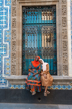 African mom and daughter traveling