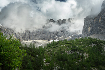 Wonderful hiking, photography and recreation place. Famous lake Sorapis with high snowy mountains at sunset, Dolomites, Italy, Europe