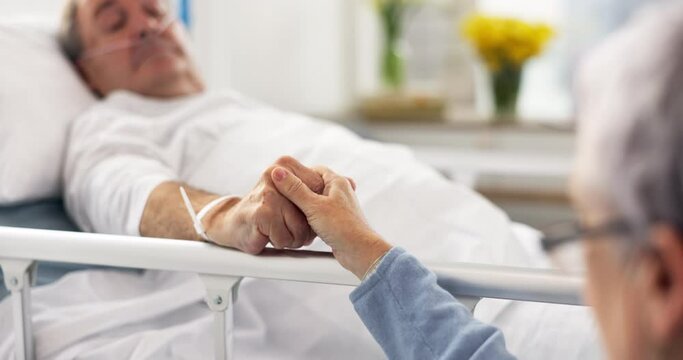 Hospital bed, love and senior couple holding hands, trust and support sick partner, husband or man with healthcare problem. Bedroom, marriage kindness and elderly woman care for mental health patient