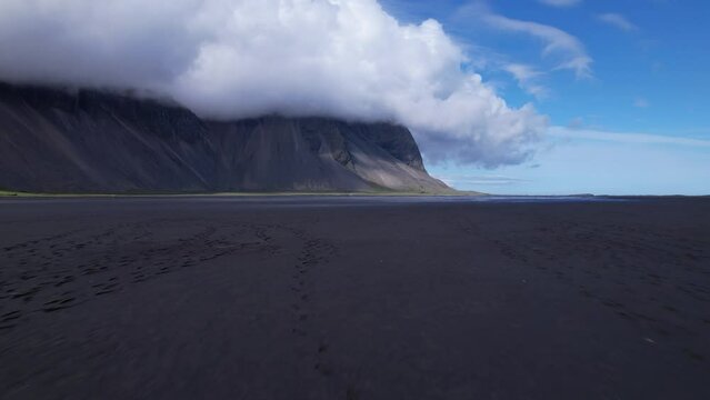 DRONE AERIAL FOOTAGE: Vestrahorn mountain and Stokksnes beach. Vestrahorn Mountain is located in southeast Iceland near the town of H&ouml;fn. 