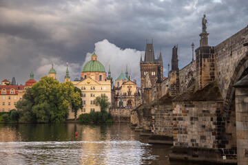 Charles Bridge in the evening with clouds - just after a storm and rain