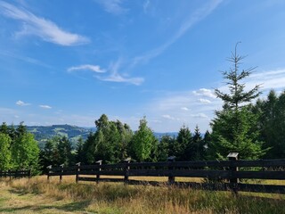 Fototapeta na wymiar landscape with fence and blue sky
