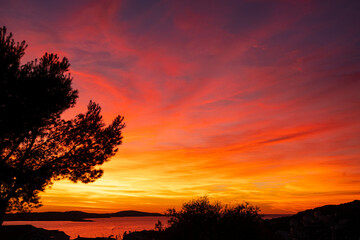 Fototapeta na wymiar Magnificent color palette of sky after sunset by the beautiful Adriatic Sea