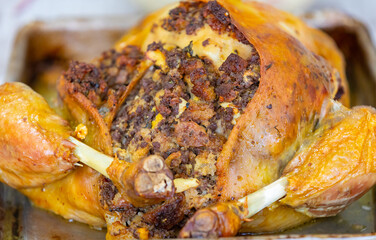 Traditional homemade mayonnaise salad with roasted chicken stuffed with Brazil-style farofa