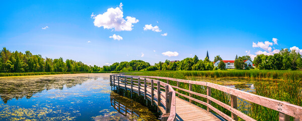 Sackville Waterfowl Park summer afternoon landscape along the boardwalk trail in New Brunswick,...