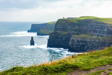Scenic view of the Cliffs of Moher in summer at sunrise