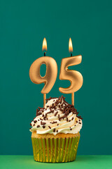 Birthday card with candle number 95 - Green background