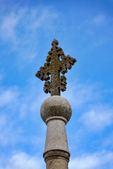 Fototapeta na wymiar Ornate Stone Cross on Church Exterior, Padua Italy